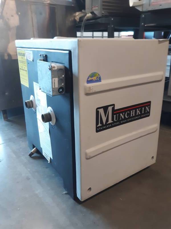 lot 9700 image: Munchkin Heater Not Tested Unknown Working Condition