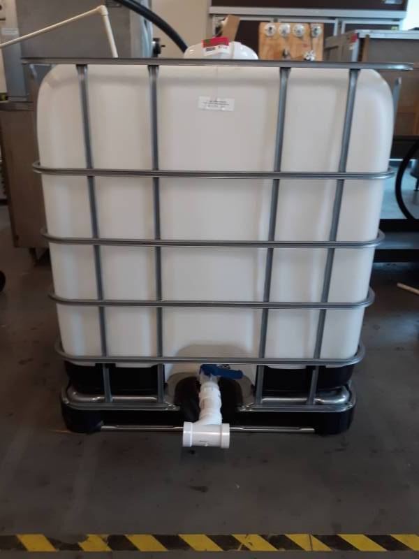 lot 9714 image: Storage Tank with Steel Enclosure