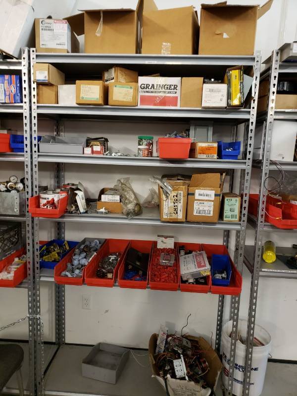 lot 8242 image: Metal storage rack with Contents