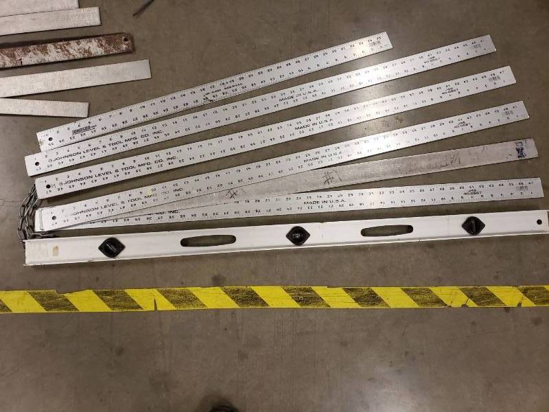 lot 8259 image: (6) rulers and a level
