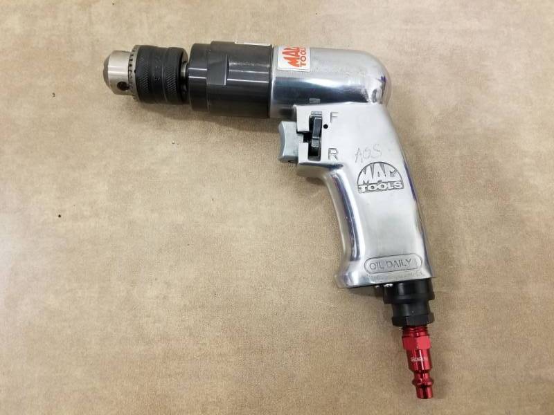 lot 7037 image: Mac Tools 38in Air Reversible Drill