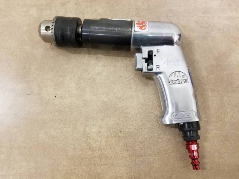 lot 7038 image: Mac Tools 12in Reversible Air Drill