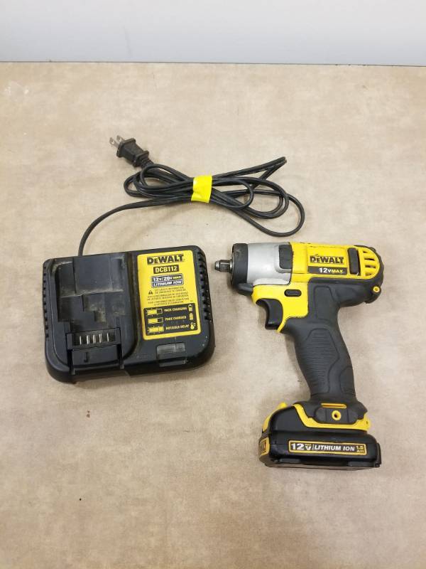 lot 7051 image: Dewalt 38in 12V Impact Drill With Charger