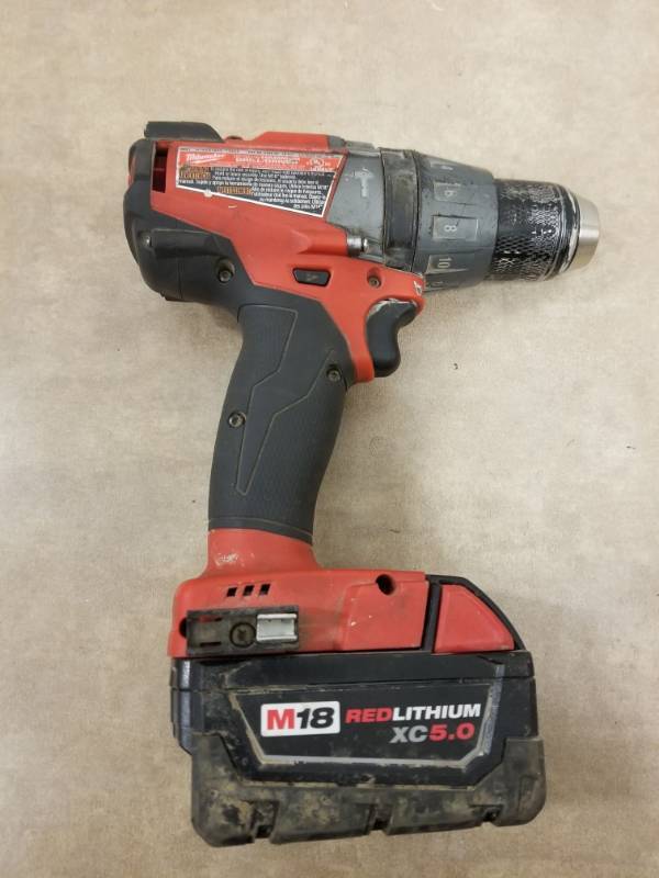 lot 7053 image: Milwaukee 12in Hammer Drill With Battery