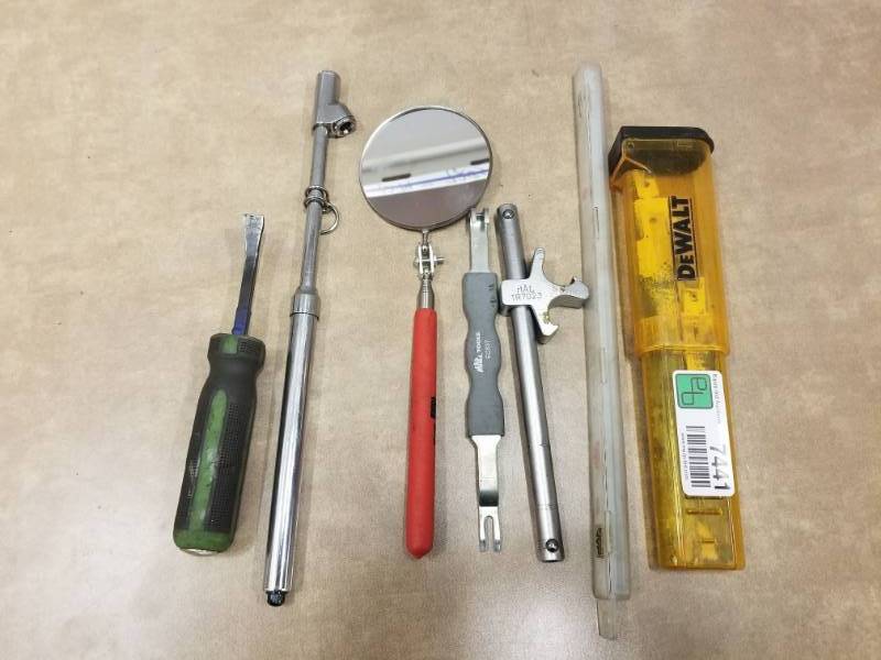 lot 7441 image: Saw Blades, Mirror, Tire Gauge and More