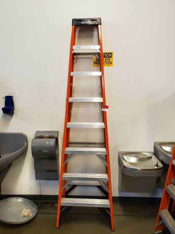 lot 9775 image: Werner 8ft Fiberglass Ladder