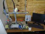 Robotic Testing Unit with Moving Control Arm and Desktop Computer Robotic Testing Unit with Moving Control Arm and Desktop Computer