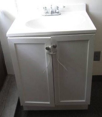 lot 5164 image: Bathroom Cabinet with Sink Top - Buyer Must Remove