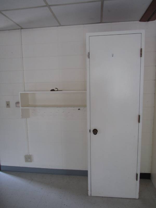 lot 5188 image: Wood Cabinet with Shelves and Wall Mounted Coat Rack Shelf