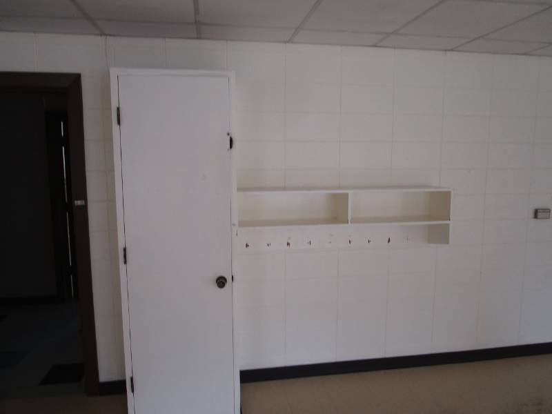 lot 5185 image: Wood Cabinet with Shelves and Wall Mounted Coat Rack Shelf
