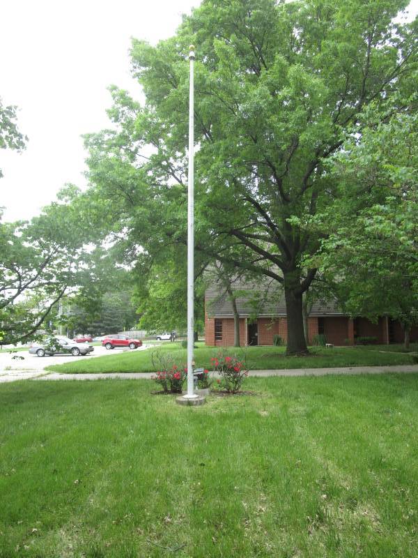 lot 5068 image: XL HD Flag Pole with Spot Light - Buyer Must Remove