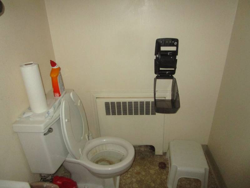 lot 5077 image: Bathroom Fixtures - Wall Hanging Porcelain Sink, Stool, Paper Towel, Toilet Paper and Hand Soap Dispensers