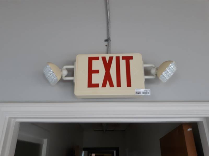 lot 5211 image: Exit Sign with Two Emergency Lights - Buyer Must Remove
