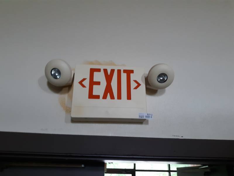 lot 5212 image: Exit Sign with Two Emergency Lights - Buyer Must Remove