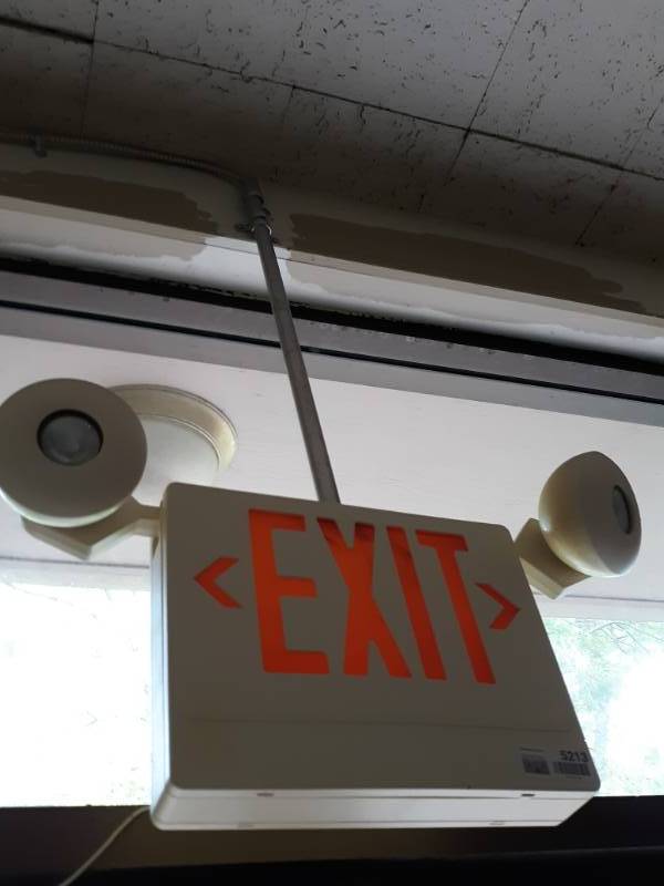 lot 5213 image: Exit Sign with Two Emergency Lights - Buyer Must Remove