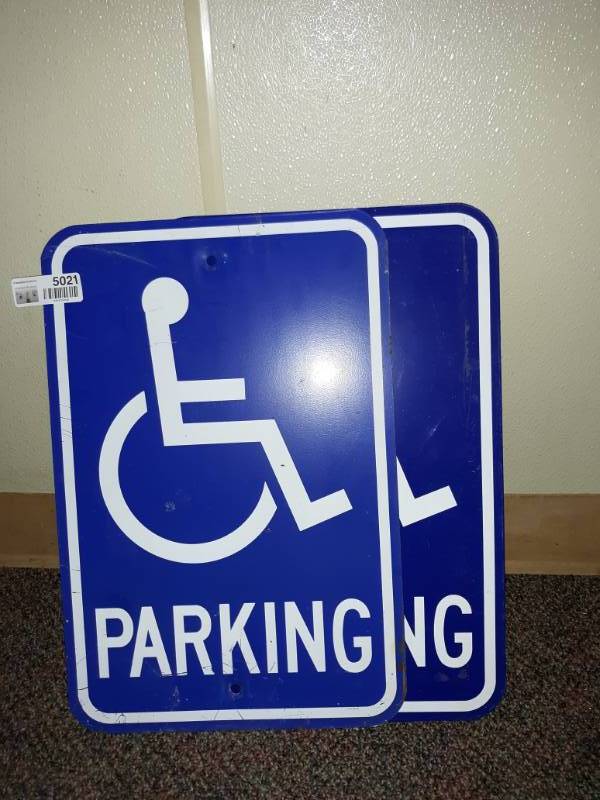lot 5021 image: Two Metal Handicap Parking Signs