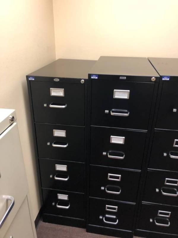 lot 4272 image: 1 Office Depot and 1 Staples Black Filing Cabinets