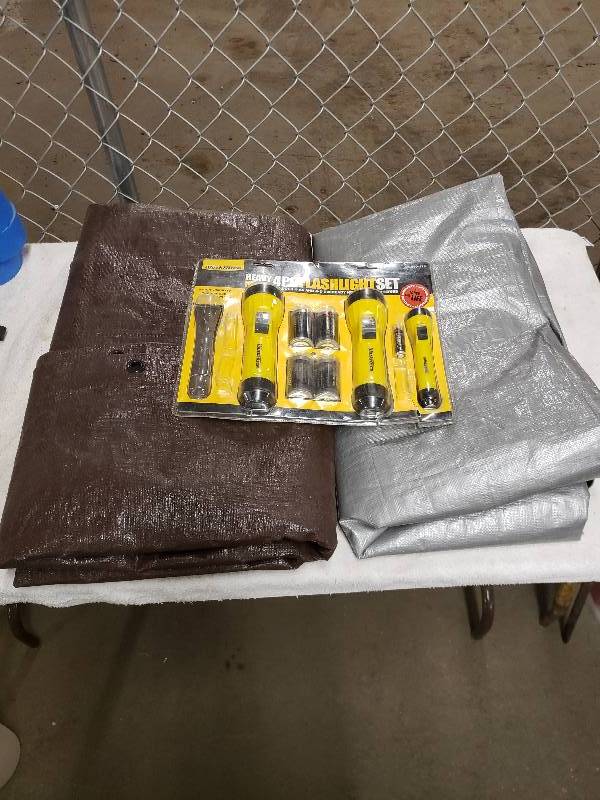 lot 10815 image: 2 Tarps and a Pack of Flashlights
