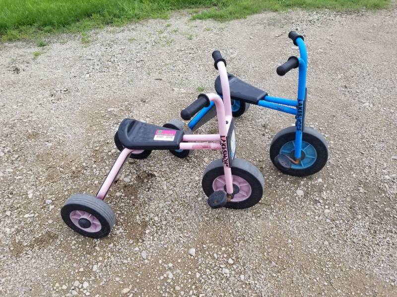 lot 3008 image: Pink and Blue Tricycles