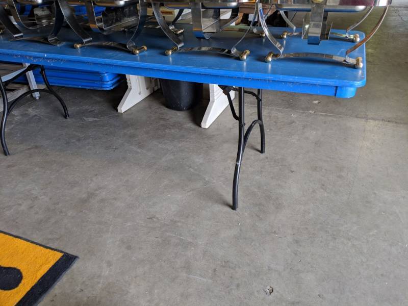 lot 3229 image: Mighty Lite Blue Plastic Top Folding Table 8Ft X 30in
