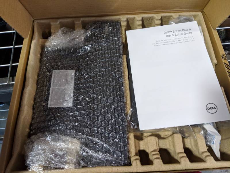 lot 3244 image: (8) Dell Laptop Docking Stations (12) New Keyboards