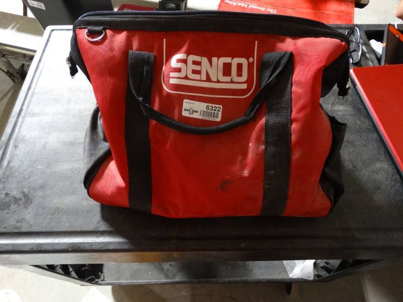 lot 6322 image: Senco cordless nail gun, battery charger no battery.