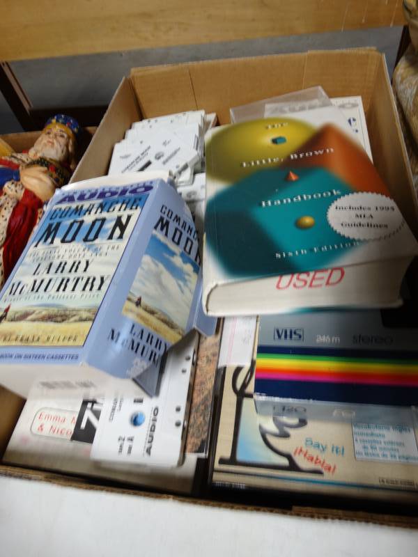 lot 6180 image: A book and cassettes.