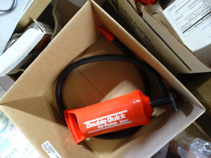 lot 6202 image: Air pump and hand held vacuum.