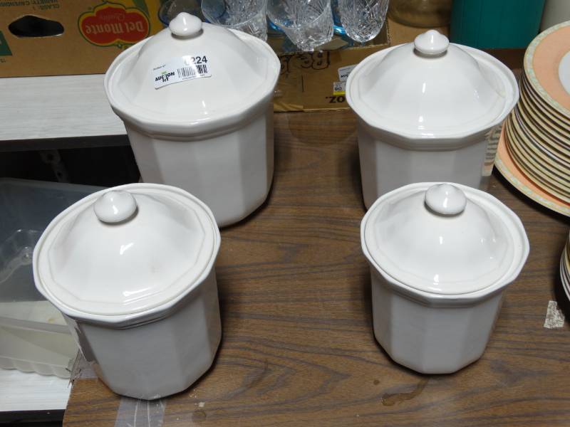 lot 6224 image: Lot of 4 glass canisters.