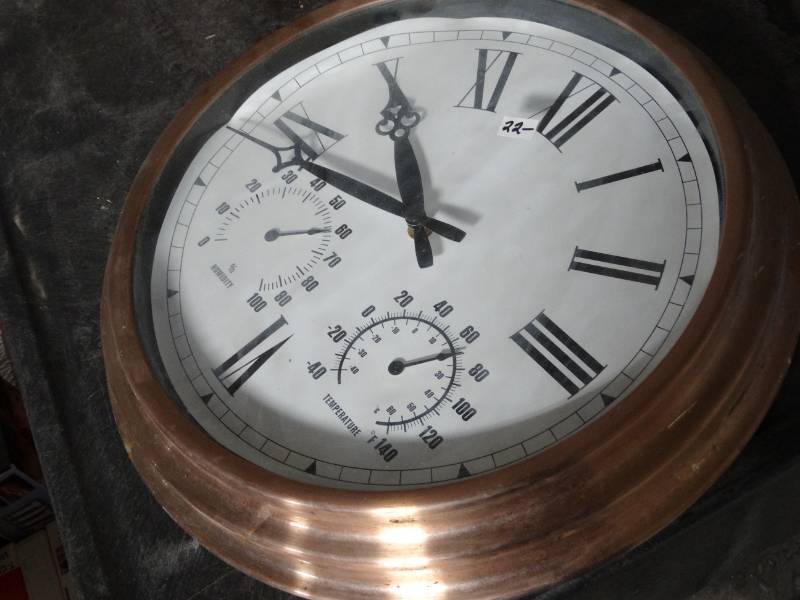 lot 6250 image: Lot with towel holder, plastic ware paper towel holder and clocks.