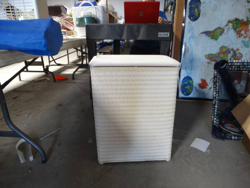 lot 6264 image: Laundry hamper with contents.
