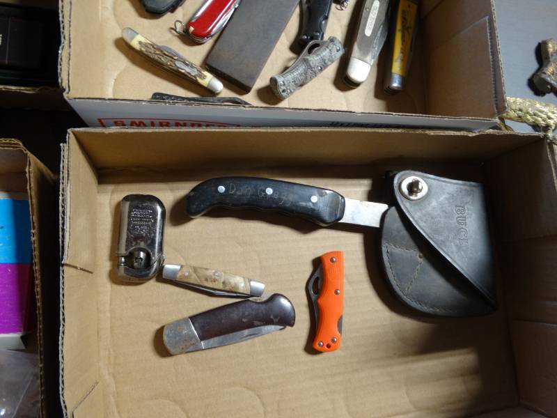 lot 6279 image: Buck hatchet and small pocket knives.