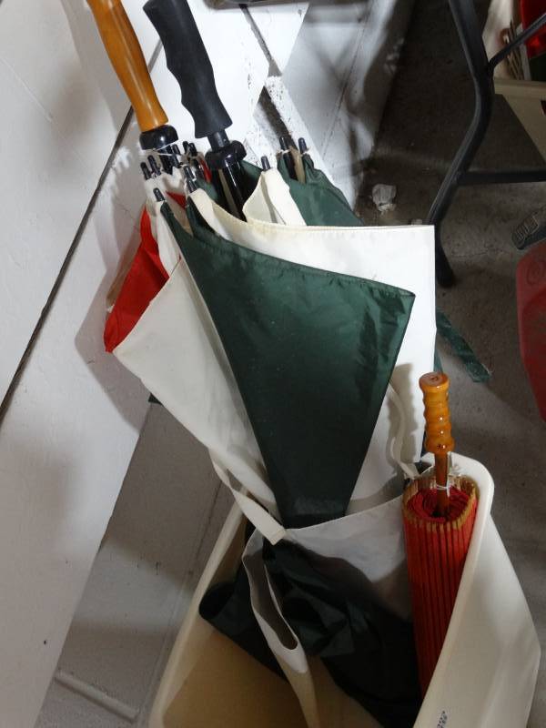 lot 6303 image: Trash can with umbrellas.