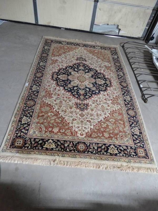 lot 6309 image: Area rug, 98 x 63.