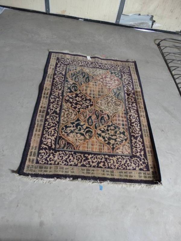 lot 6311 image: Area rug, 58 x 49.