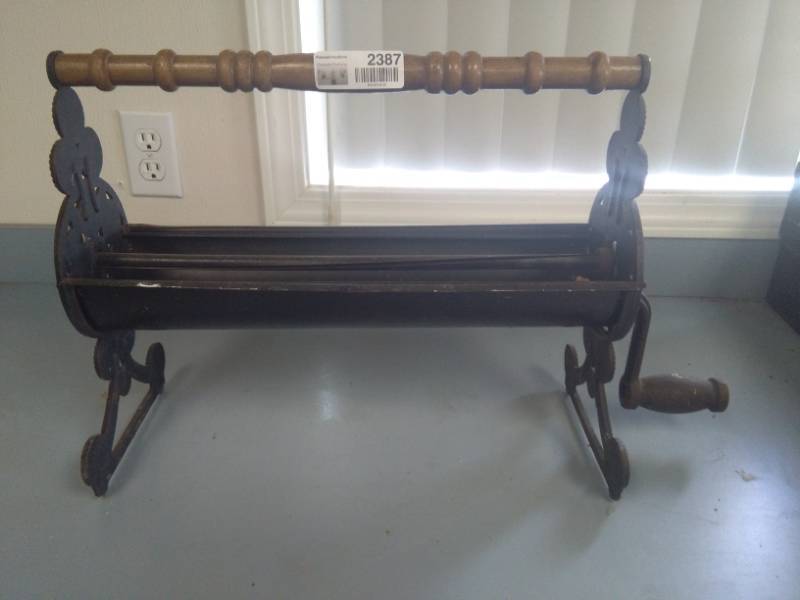 lot 2387 image: Vintage Newspaper Log Roller