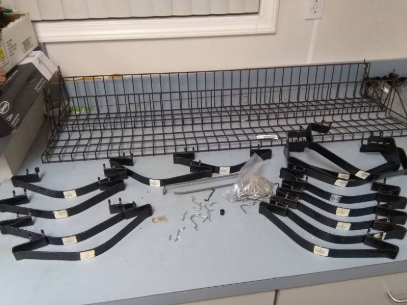 lot 5457 image: Metal Pegboard Shelves and Pegboard Metal Hangers Lot