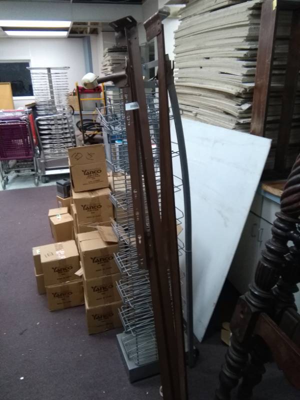 lot 5459 image: Metal Merchandising Rack with Wheels and Queen Size Metal Bed Frame