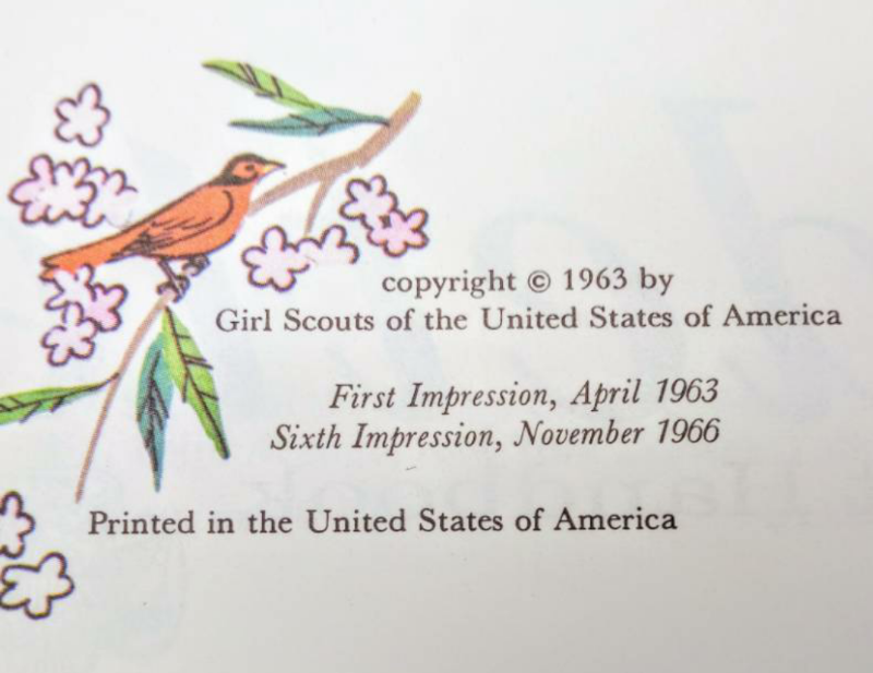lot 2309 image: Girl Scout Book and Necklace