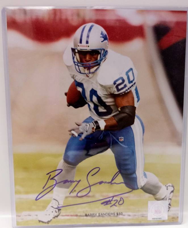 lot 2332 image: Autographed Photo With COA- Barry Sanders- Hall of Fame Running Back- WOW