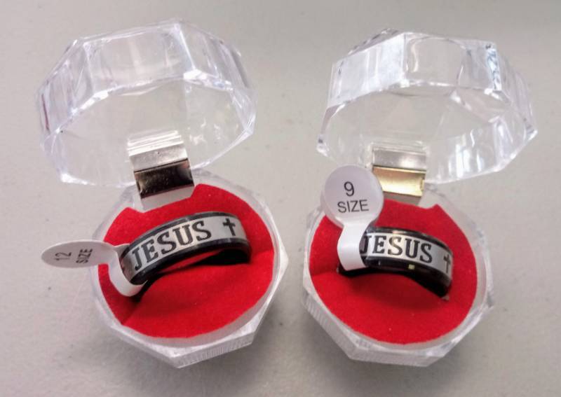 lot 1993 image: His & Hers Stainless Jesus Rings  Sizes 12 & 9
