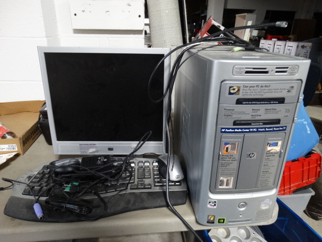 lot 6360 image: HP desk top computer with keyboard and mouse.