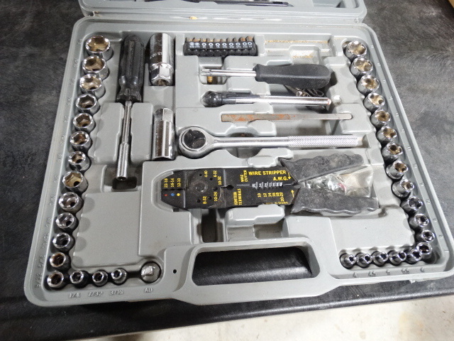 lot 6376 image: Ratchet wrench with sockets, wire stripper, screw driver with bits.