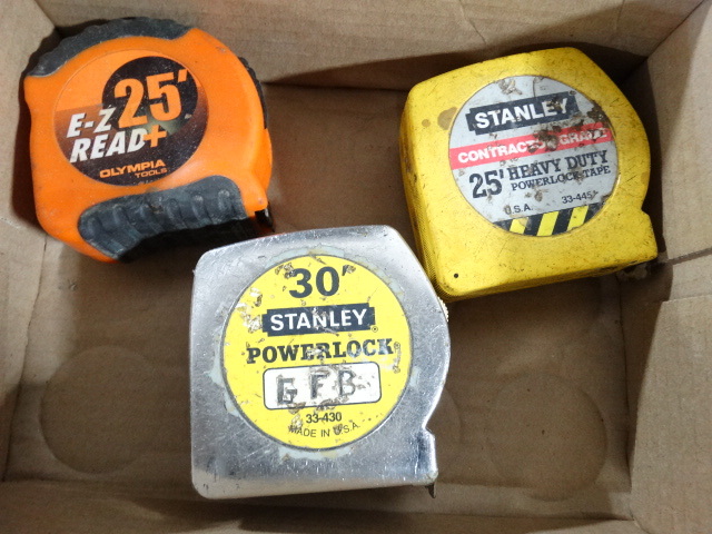 lot 6384 image: 2- 25 and 1- 30 tape measure.