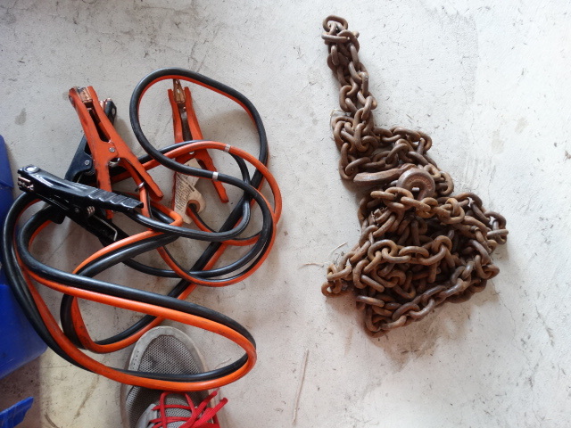 lot 6443 image: Jumper cables and ratchet straps and a tow chain.