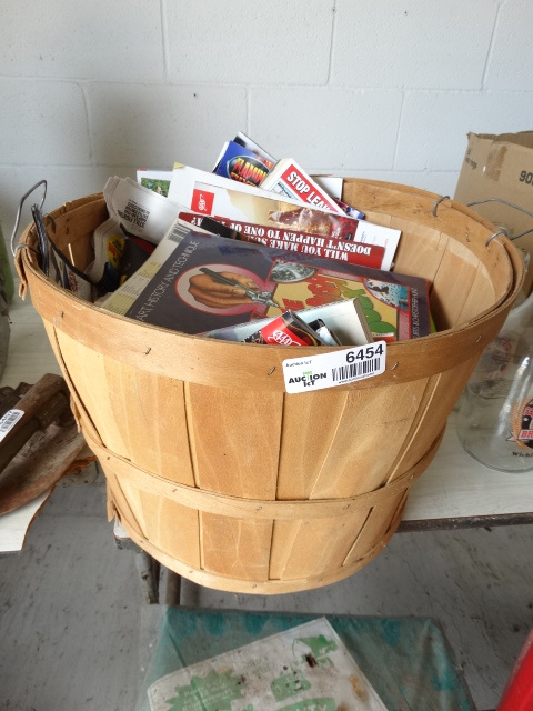 lot 6454 image: Apple basket with magazines.