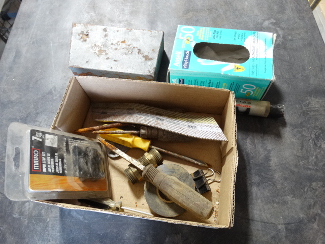 lot 6481 image: Lot with vinyl latex free gloves, nails for nail gun, propoxy 20, drill bits and more.