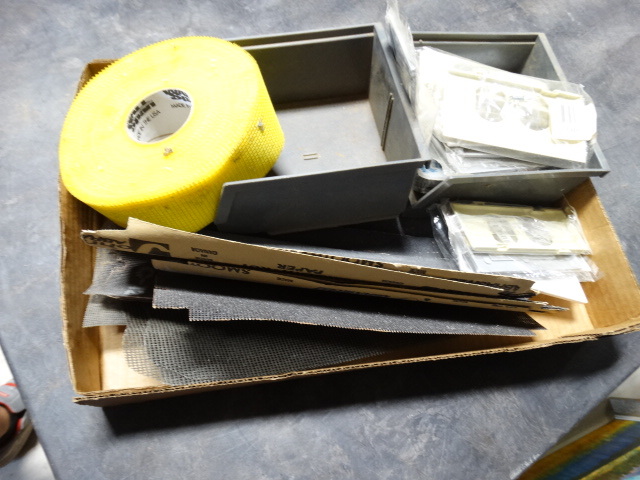 lot 6495 image: Lot with wall span, sanding paper, parts bin and more.