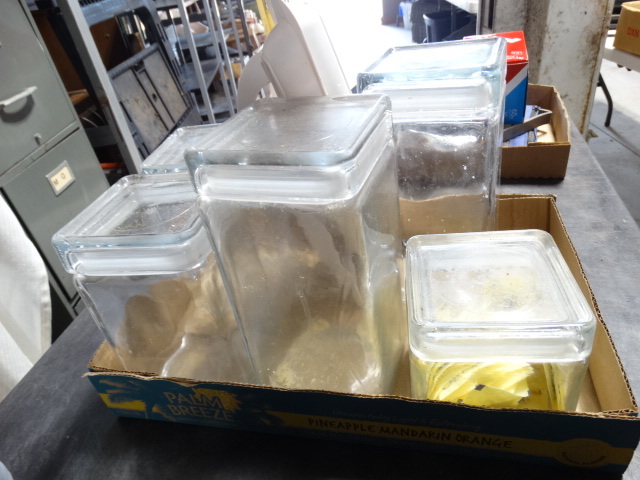 lot 6511 image: Lot of glass canisters and cheese grader.