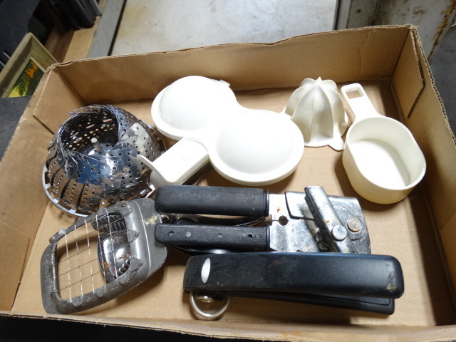 lot 6513 image: Lot with strainer, can opener, measuring cup slicer and more.